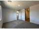 Comfortable bedroom featuring neutral carpet, ample natural light, and closet access at 4329 E Brook Lynn Pl, San Tan Valley, AZ 85143