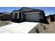 Attractive single-story home with a well-manicured front yard and a spacious two-car garage at 4329 E Brook Lynn Pl, San Tan Valley, AZ 85143