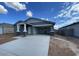 Exterior shot of a single-story home with an open car port and welcoming entrance at 4329 E Brook Lynn Pl, San Tan Valley, AZ 85143