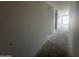 Bright hallway with modern recessed lighting, ready for personalization and finishing touches at 4329 E Brook Lynn Pl, San Tan Valley, AZ 85143