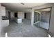A spacious kitchen area boasts a large sliding glass door and ample natural light, ready for customization at 4329 E Brook Lynn Pl, San Tan Valley, AZ 85143