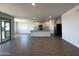 Open floor plan of the living area and kitchen with tile flooring at 4329 E Brook Lynn Pl, San Tan Valley, AZ 85143