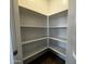 Walk-in pantry providing ample storage and shelving space at 4329 E Brook Lynn Pl, San Tan Valley, AZ 85143