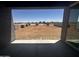 Covered patio view of the property and surrounding undeveloped desert landscape at 4329 E Brook Lynn Pl, San Tan Valley, AZ 85143