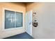 Cozy front porch features a security door, a window, and personalized decor to welcome guests at 4343 E Contessa St, Mesa, AZ 85205