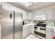 A well-maintained kitchen features gray cabinets and stainless steel appliances at 4343 E Contessa St, Mesa, AZ 85205