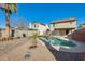 Private backyard pool with palm trees, creating a serene oasis for relaxation and recreation at 4343 E Contessa St, Mesa, AZ 85205