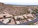 Aerial view of desert homes nestled amongst the cacti and desert landscape at 4903 S Desert Willow Dr, Gold Canyon, AZ 85118