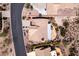 Aerial view of a desert home featuring a private backyard, desert landscaping and access to neighborhood street at 4903 S Desert Willow Dr, Gold Canyon, AZ 85118