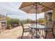 Relaxing outdoor patio with seating area, fireplace and views at 4903 S Desert Willow Dr, Gold Canyon, AZ 85118