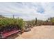 Outdoor space featuring desert landscaping, a fountain, and comfortable seating at 4903 S Desert Willow Dr, Gold Canyon, AZ 85118