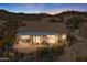 Backyard with patio, desert landscaping, mountain views and outdoor seating at 4903 S Desert Willow Dr, Gold Canyon, AZ 85118