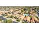 Aerial view of homes in a neighborhood, with the community pool providing an appealing amenity at 5016 E Waltann Ln, Scottsdale, AZ 85254