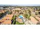 Community aerial view showing a pool and a community recreation area with lush landscaping at 5016 E Waltann Ln, Scottsdale, AZ 85254