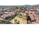 Aerial view featuring the community pool with lush landscaping and a walking path at 5016 E Waltann Ln, Scottsdale, AZ 85254