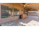 Covered patio with ceiling fans, built-in grill, counter space, and tiled flooring at 5016 E Waltann Ln, Scottsdale, AZ 85254
