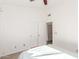Bright bedroom featuring a ceiling fan, closet and an adjoining room at 5016 E Waltann Ln, Scottsdale, AZ 85254