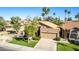 Attractive single-Gathering home with a tile roof, two-car garage, and mature trees at 5016 E Waltann Ln, Scottsdale, AZ 85254