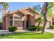 Charming single-story home featuring a tile roof and well-maintained landscaping at 5016 E Waltann Ln, Scottsdale, AZ 85254