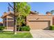 Charming single-story home featuring a well-maintained lawn and a two-car garage at 5016 E Waltann Ln, Scottsdale, AZ 85254