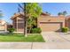 Charming single-story home featuring a well-maintained lawn and a two-car garage at 5016 E Waltann Ln, Scottsdale, AZ 85254