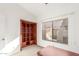 Office space featuring a built-in bookcase and natural light at 5016 E Waltann Ln, Scottsdale, AZ 85254