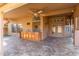 An outdoor patio features tile flooring, ceiling fans and a built in counter at 5016 E Waltann Ln, Scottsdale, AZ 85254