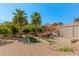 Landscaped backyard featuring well-maintained greenery, desert landscaping, and mature trees for outdoor enjoyment at 5206 N 16Th Dr, Phoenix, AZ 85015