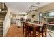 Open concept dining room adjoining the kitchen with access to patio at 5206 N 16Th Dr, Phoenix, AZ 85015