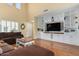 Bright living room with built-in shelving and high ceilings at 5206 N 16Th Dr, Phoenix, AZ 85015