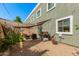 Private patio area with awning, perfect for outdoor dining and relaxation, surrounded by well maintained landscaping at 5206 N 16Th Dr, Phoenix, AZ 85015