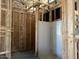 Framed bathroom with plywood and new shower showcasing built in shelving at 5519 S 240Th Ln, Buckeye, AZ 85326