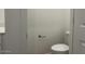 Bathroom with toilet and neutral colored walls at 5519 S 240Th Ln, Buckeye, AZ 85326