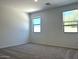 Bedroom with carpet and bright natural light at 5519 S 240Th Ln, Buckeye, AZ 85326