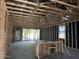 Interior view of framed room showing ceiling supports, window and plumbing at 5519 S 240Th Ln, Buckeye, AZ 85326