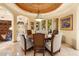 Dining room with circular ceiling design, a chandelier, windows, and space for a large table at 6402 E Chaparral Rd, Paradise Valley, AZ 85253