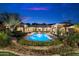 Stunning backyard pool with well-maintained landscaping creating a private and luxurious outdoor experience at 6402 E Chaparral Rd, Paradise Valley, AZ 85253