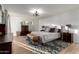 Bright bedroom featuring a large window, a patterned rug, and neutral decor for a serene and relaxing atmosphere at 6718 N 19Th Pl, Phoenix, AZ 85016