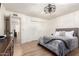 Bedroom featuring a comfortable bed, ample closet space, and neutral decor for a relaxing retreat at 6718 N 19Th Pl, Phoenix, AZ 85016