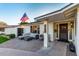 Inviting front entrance featuring a charming outdoor seating area and brick paver patio at 6718 N 19Th Pl, Phoenix, AZ 85016