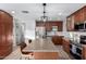 Modern kitchen featuring a granite island, stainless appliances, and abundant storage at 6718 N 19Th Pl, Phoenix, AZ 85016