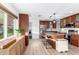 Spacious kitchen with a breakfast bar, wooden cabinets, and stainless-steel appliances at 6718 N 19Th Pl, Phoenix, AZ 85016