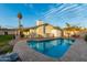 Backyard swimming pool, patio, storage shed, basketball hoop, and house at 6718 N 19Th Pl, Phoenix, AZ 85016