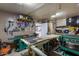 Equipped workshop featuring a sturdy workbench, woodworking tools, and ample lighting for various projects at 6718 N 19Th Pl, Phoenix, AZ 85016