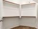 Walk-in closet with built-in shelving, providing ample storage for clothes and accessories at 7401 W Arrowhead Clubhouse Dr # 1006, Glendale, AZ 85308
