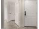 Inviting foyer featuring tile flooring and multiple access doors at 7401 W Arrowhead Clubhouse Dr # 1006, Glendale, AZ 85308