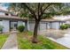 Charming townhome with two-car garage, tile roof, and mature landscaping at 7401 W Arrowhead Clubhouse Dr # 1006, Glendale, AZ 85308