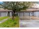 Charming townhome with two-car garage, tile roof, and mature landscaping at 7401 W Arrowhead Clubhouse Dr # 1006, Glendale, AZ 85308
