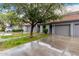 Charming townhome with two-car garage, tile roof, and mature landscaping at 7401 W Arrowhead Clubhouse Dr # 1006, Glendale, AZ 85308