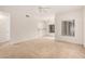 Open-concept living room with bright natural light and neutral tones at 7401 W Arrowhead Clubhouse Dr # 1006, Glendale, AZ 85308